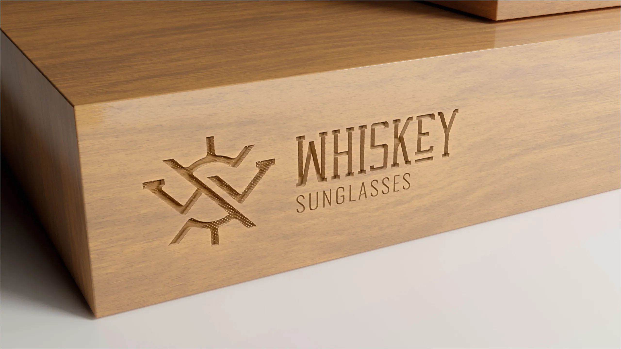 Whiskey Sunglasses W/S monogram and logo variants on a warm earthy palette